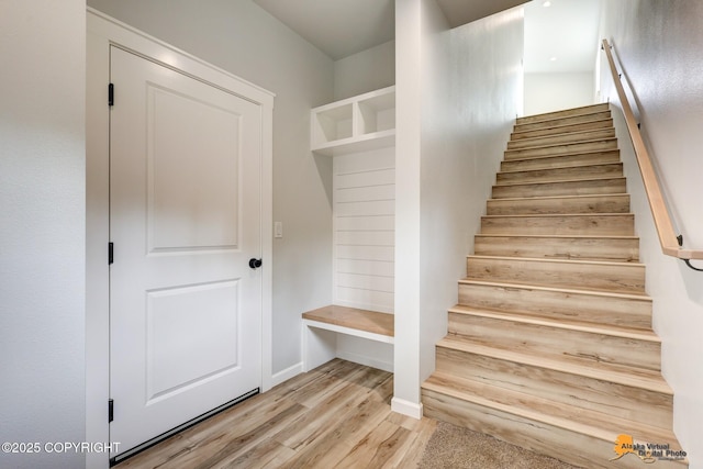 3696 S Alvaro Dr, Wasilla, AK 99654 - mudroom featuring light wood-type flooring and baseboards