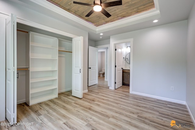 3696 S Alvaro Dr, Wasilla, AK 99654 - unfurnished bedroom with a tray ceiling, wooden ceiling, recessed lighting, light wood-style floors, and a closet