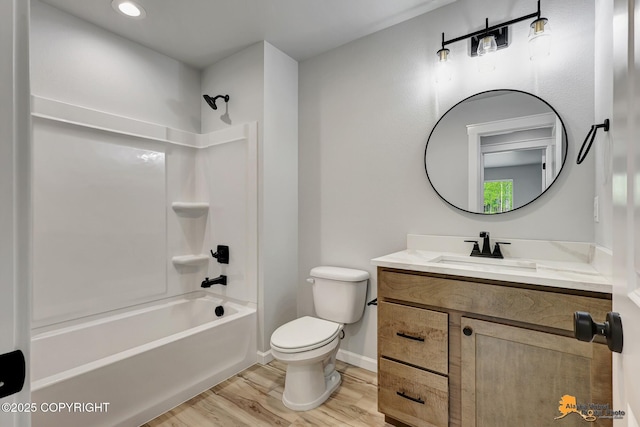 3696 S Alvaro Dr, Wasilla, AK 99654 - full bathroom featuring vanity, bathing tub / shower combination, wood finished floors, and recessed lighting