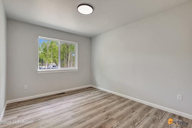 3696 S Alvaro Dr, Wasilla, AK 99654 - empty room with wood finished floors