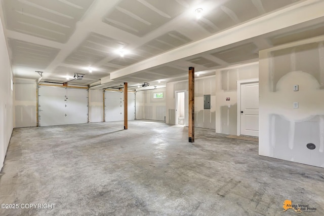 3696 S Alvaro Dr, Wasilla, AK 99654 - garage with electric panel and a garage door opener