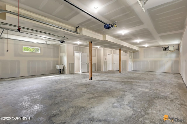 3696 S Alvaro Dr, Wasilla, AK 99654 - garage featuring a garage door opener
