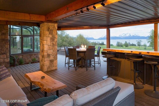 41345 Alan St, Homer, AK 99603 - deck with outdoor dry bar, a mountain view, and an outdoor living space