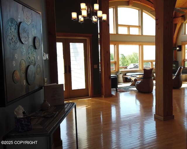 41345 Alan St, Homer, AK 99603 - doorway to outside featuring an inviting chandelier, wood finished floors, and french doors