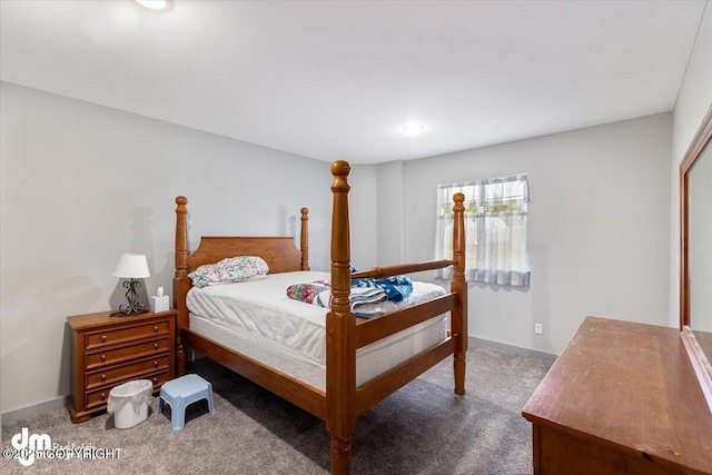 carpeted bedroom with baseboards
