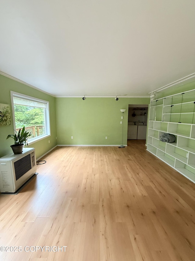 12399 Blackberry Ln, Ketchikan, AK 99901 - unfurnished living room with light wood finished floors and ornamental molding