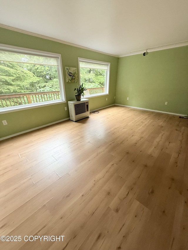 12399 Blackberry Ln, Ketchikan, AK 99901 - unfurnished room featuring ornamental molding and wood finished floors