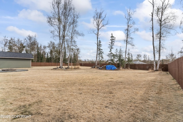 view of yard featuring a fenced backyard