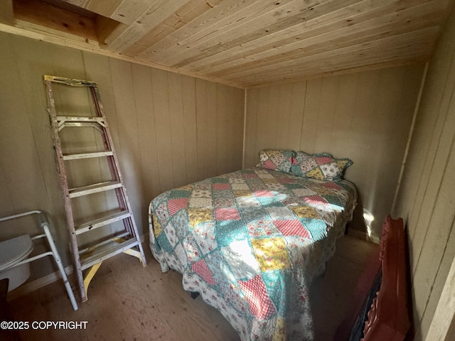 70859 Tall Tree Ave, Anchor Point, AK 99556 - bedroom with wooden ceiling, wood finished floors, and wooden walls