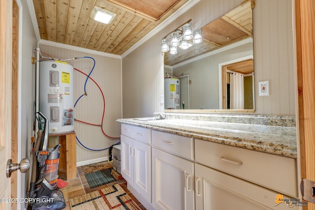 bathroom with crown molding, water heater, and vanity
