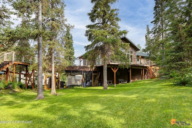 16900 Ransom Ridge Rd, Anchorage, AK 99516 - rear view of property with stairway, a deck, and a yard