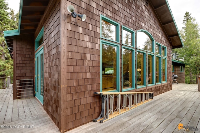 16900 Ransom Ridge Rd, Anchorage, AK 99516 - wooden terrace with grilling area