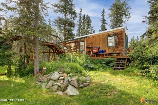 16900 Ransom Ridge Rd, Anchorage, AK 99516 - rear view of property featuring stairway and a wooden deck