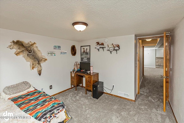 10209 Colville St, Eagle River, AK 99577 - bedroom featuring baseboards, carpet flooring, a textured ceiling, and visible vents