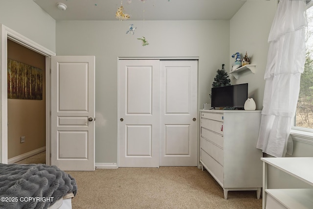 3604 N Copperspike St, Wasilla, AK 99623 - bedroom featuring a closet and light colored carpet