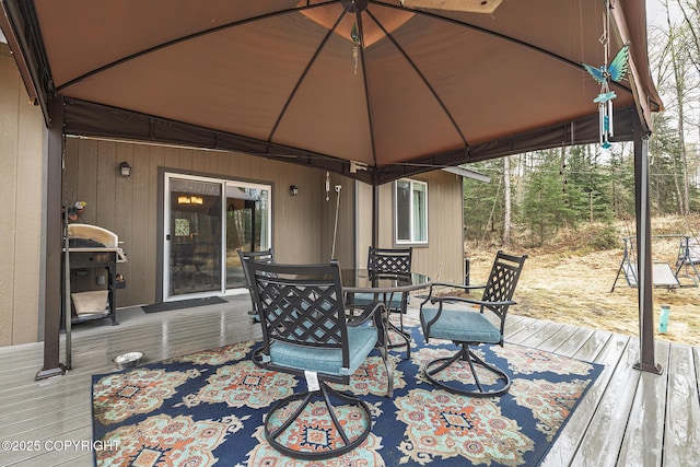 3604 N Copperspike St, Wasilla, AK 99623 - wooden deck featuring a gazebo, outdoor dining space, and area for grilling