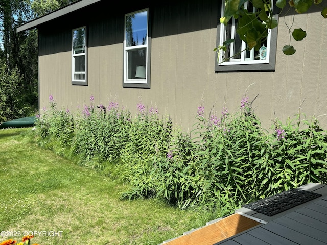 3604 N Copperspike St, Wasilla, AK 99623 - view of side of property with a lawn
