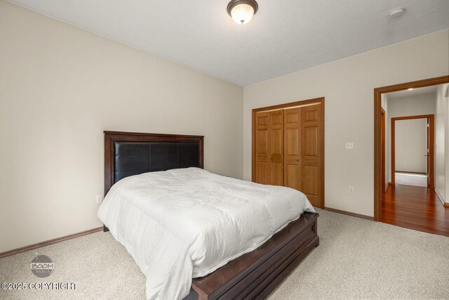 3600 N Fortune Cir, Wasilla, AK 99654 - bedroom with carpet floors, baseboards, and a closet