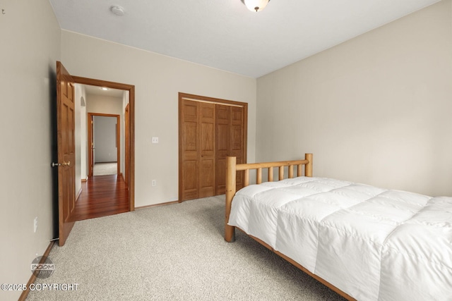 3600 N Fortune Cir, Wasilla, AK 99654 - bedroom featuring carpet flooring, a closet, and baseboards