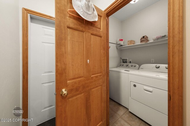 3600 N Fortune Cir, Wasilla, AK 99654 - clothes washing area featuring washer and clothes dryer and light tile patterned floors