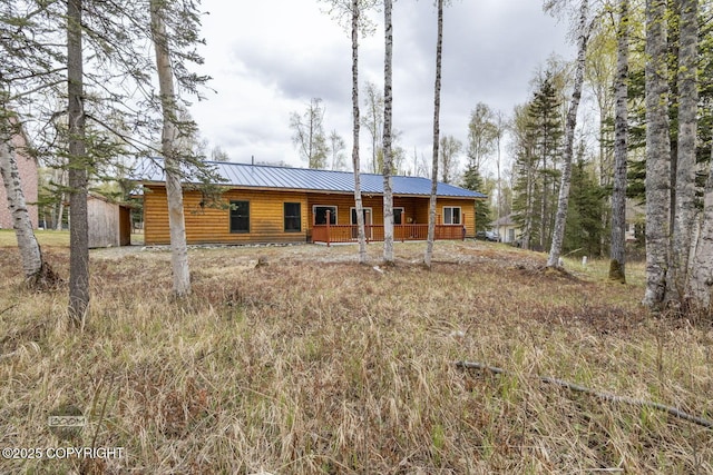 3600 N Fortune Cir, Wasilla, AK 99654 - view of front facade with metal roof and faux log siding