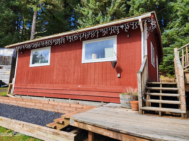 view of home's exterior featuring a deck