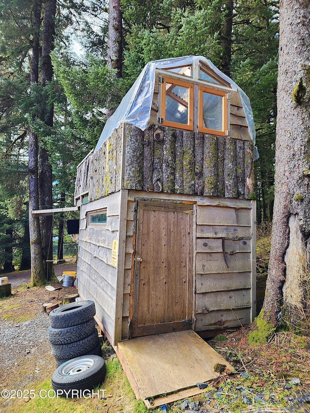 view of outbuilding featuring an outdoor structure