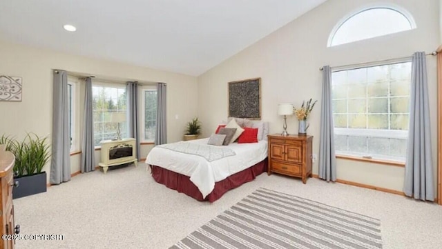 21899 Sterling Hwy, Cooper Landing, AK 99572 - bedroom with baseboards, high vaulted ceiling, and light colored carpet