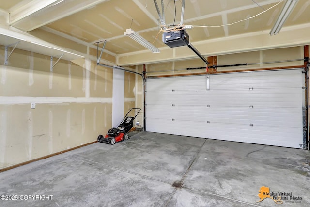 garage featuring a garage door opener