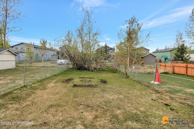 view of yard with a residential view