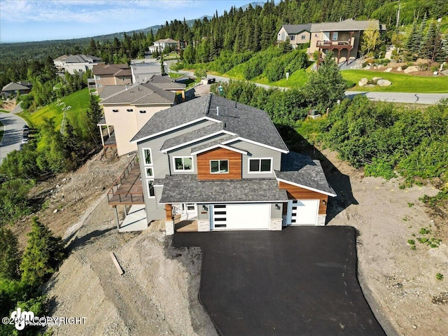 6485 Prominence Pointe Dr, Anchorage, AK 99516 - aerial view of property and surrounding area with a forest