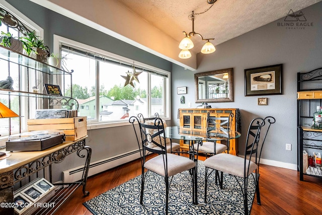 2000 Wenmatt Cir, Anchorage, AK 99517 - dining room featuring a baseboard heating unit, a textured ceiling, wood finished floors, lofted ceiling, and a chandelier