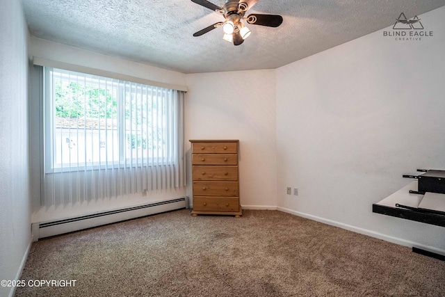 2000 Wenmatt Cir, Anchorage, AK 99517 - empty room with baseboard heating, carpet floors, a ceiling fan, and a textured ceiling
