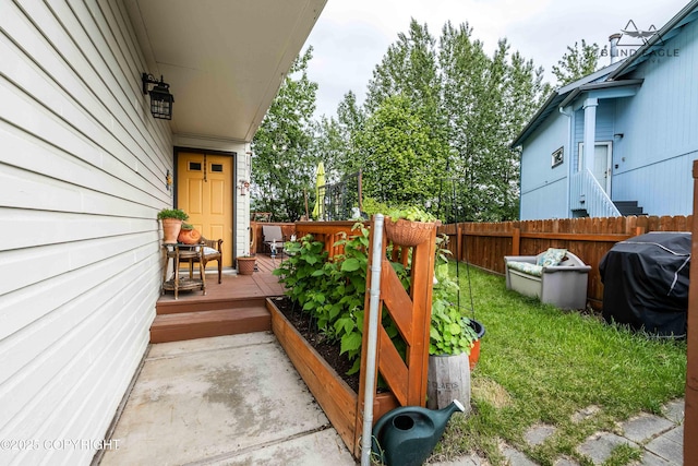 2000 Wenmatt Cir, Anchorage, AK 99517 - view of patio / terrace with area for grilling and a wooden deck