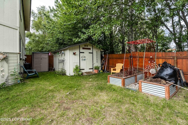 2000 Wenmatt Cir, Anchorage, AK 99517 - view of yard with a storage shed and a garden