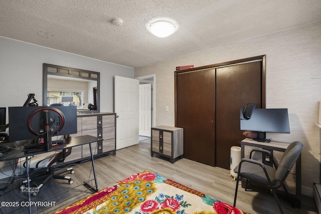1851 E 53rd Ave, Anchorage, AK 99507 - home office with a textured ceiling and light wood-type flooring