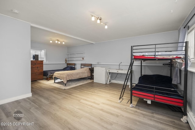 1851 E 53rd Ave, Anchorage, AK 99507 - bedroom with baseboards and wood finished floors