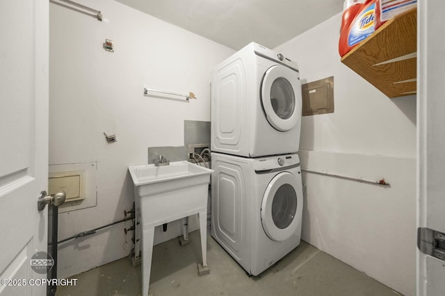 1851 E 53rd Ave, Anchorage, AK 99507 - clothes washing area featuring laundry area and stacked washer and dryer