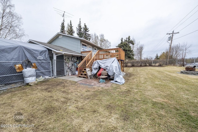 1851 E 53rd Ave, Anchorage, AK 99507 - view of yard with a fenced backyard and a wooden deck