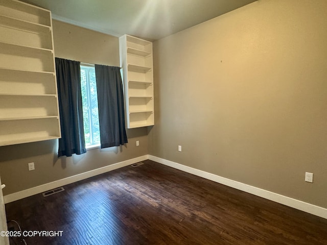 6230 N Crupperdock Dr, Palmer, AK 99645 - unfurnished room with dark wood-style floors and baseboards