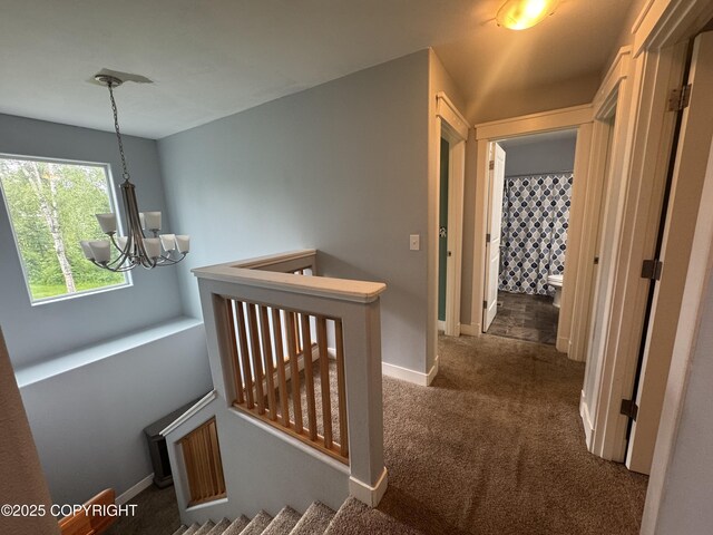 6230 N Crupperdock Dr, Palmer, AK 99645 - hall with an upstairs landing, a chandelier, and carpet flooring