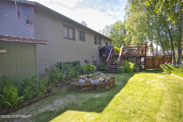 104 Beech Ave, Kenai, AK 99611 - view of yard with a wooden deck and stairway