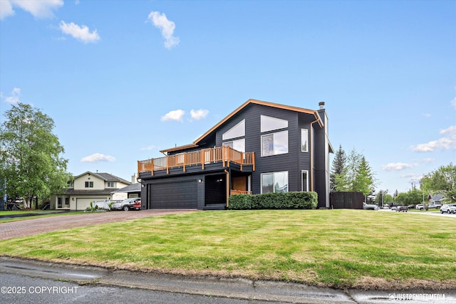 800 Howard Cir, Anchorage, AK 99504 - view of front of property with a chimney, a front lawn, and asphalt driveway