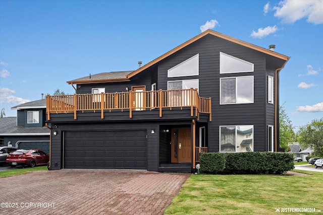 800 Howard Cir, Anchorage, AK 99504 - view of front of house with a balcony, decorative driveway, and a front lawn