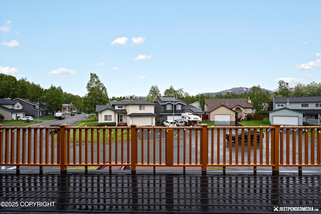 800 Howard Cir, Anchorage, AK 99504 - wooden terrace with a residential view and a mountain view