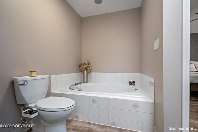 800 Howard Cir, Anchorage, AK 99504 - full bath featuring a garden tub, toilet, and wood finished floors