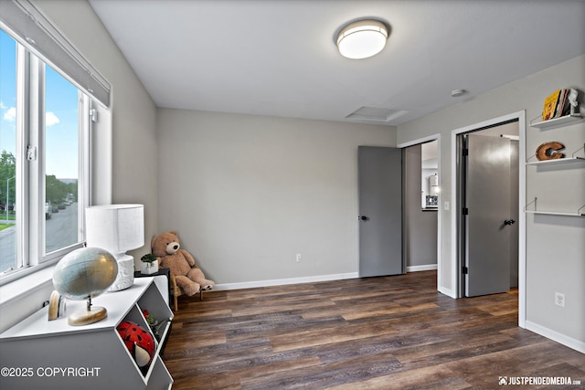 800 Howard Cir, Anchorage, AK 99504 - rec room with dark wood-style floors, baseboards, and attic access
