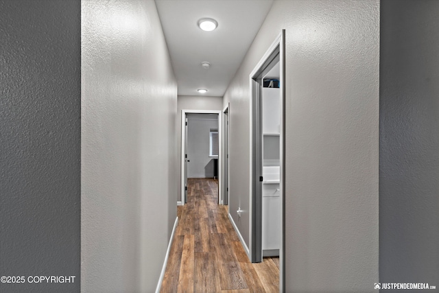 800 Howard Cir, Anchorage, AK 99504 - corridor with wood finished floors and baseboards