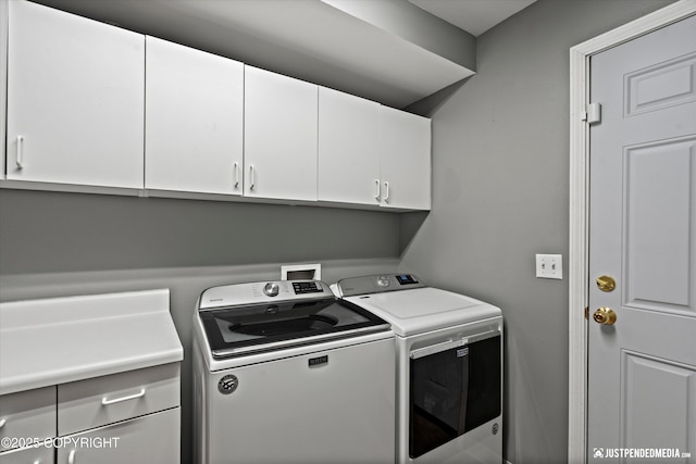 800 Howard Cir, Anchorage, AK 99504 - laundry area featuring cabinet space and washer and dryer