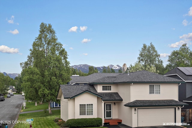 800 Howard Cir, Anchorage, AK 99504 - traditional home featuring an attached garage and a mountain view